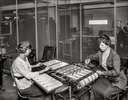 Washington, D.C., circa 1919. "War Risk Bureau check writing." From its genesis as a Treasury Department agency at the start of World War I, the Bureau of War Risk Insurance gradually morphed into today's Department of Veterans Affairs. National Photo Co. View full size.