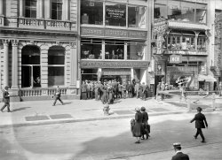New York circa 1921. "New York Band Instrument Co., East 14th Street." Dealer in Victrolas and Victor records, also seen here in its window display. Next door: Great China Chop Suey. 5x7 glass negative, Bain News Service. View full size.