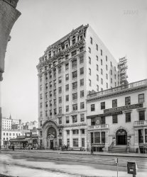 Washington, D.C., circa 1918. "District National Bank, exterior, G Street N.W." Scrubbing in progress, or a new addition? 8x6 inch glass negative, National Photo Company. View full size.