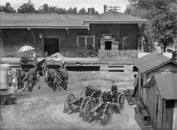 Washington, D.C., circa 1901. "View of S.W. Block 386, probably D Street side of Baltimore & Potomac Railroad freight station at Maryland & D, 9th & 10th Streets, showing man loading freight into delivery wagon." 5x7 glass negative, D.C. Street Survey Collection. View full size.