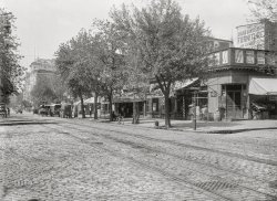 Washington, D.C., circa 1901. "View of E Street N.W., north side, looking west from 12th Street." 5x7 inch glass negative, D.C. Street Survey Collection.  View full size.