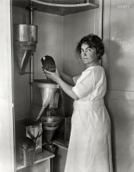 Washington, D.C., 1922. "Department of Agriculture. First device to accurately measure a loaf of bread in cubic centimeters has been perfected by Bureau of Agricultural Economics." Harris & Ewing glass negative. View full size.