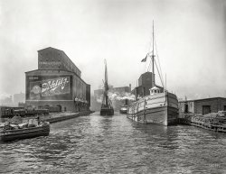 September 1, 1900. "Chicago River elevators at Chicago, Illinois." 8x10 inch dry plate glass negative, Detroit Publishing Company. View full size.