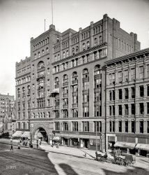 Cleveland, Ohio, circa 1900. "The Arcade Building, Superior Avenue." (Interior view here.) Ground-floor tenants include the Hat Box, Arcade Pants Parlors and, next door, a Misfit Clothing Parlor (a.k.a. Fitwell Clothing) and Chisholm's Boot Shop. 8x10 inch glass negative, Detroit Publishing Co. View full size.