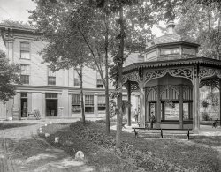 Circa 1906. "High Rock Spring, Saratoga, N.Y." Yesterday's water boy makes a reappearance at the hydration gazebo, along with three coworkers and a vaguely familiar gent with a bicycle. 8x10 inch dry plate glass negative, Detroit Publishing Company. View full size.