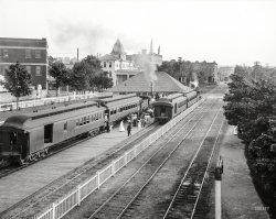 Circa 1906. "Suburban station at Petoskey, Michigan." A locomotive of the Grand Rapids & Indiana Railroad, with a car bearing the names of Little Traverse Bay and Crooked and Walloon Lakes. 8x10 inch glass negative, Detroit Publishing Company. View full size.