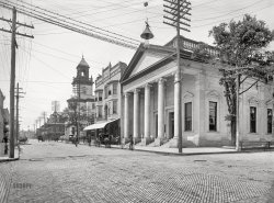Jacksonville, Florida, circa 1900. "Bank and post office, Forsyth Street." The National Bank of Jacksonville at Forsyth and Laura, next to Castle Hall of the Knights of Pythias. 8x10 inch glass negative by William Henry Jackson, Detroit Photographic Company. View full size.