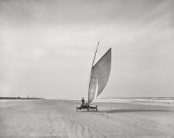 Circa 1903. "Sailing on the beach at Ormond, Florida." 8x10 inch dry plate glass negative, Detroit Photographic Company. View full size.