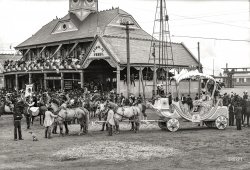 1906. "Mardi Gras in New Orleans. The Royal chariot with Rex at Canal Street ferry." 8x10 inch glass negative, Detroit Publishing Company. View full size.