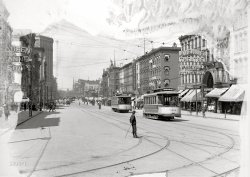 Detroit circa 1905. "Woodward Avenue, looking north from Jefferson" -- vantage on an abundance of bulb-studded signage and electric streetcars, as well as two giant "moonlight tower" lighting standards. 8x10 glass negative, with water damage at the edges. View full size.