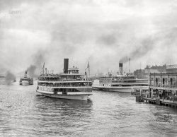 The Detroit River circa 1906. "Excursion steamers at Belle Isle ferry dock, Woodward Avenue." 8x10 inch dry plate glass negative, Detroit Publishing Company. View full size.