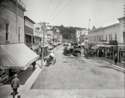 Circa 1908. "Main Street, Mackinac Island, Michigan." No motor traffic allowed, but postcards and dentists galore. 8x10 inch glass negative, Detroit Publishing Company. View full size.