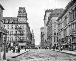 Circa 1909. "Madison Avenue, Toledo." An outpost of Penna. Painless Dentists, showing those native Ohio Tooth Torturers how it's done. View full size.