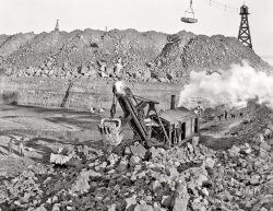 "Livingstone Channel -- steam shovel removing rock loosened by dynamite." Circa 1910, construction of the navigation channel along the Detroit River. 8x10 inch dry plate glass negative, Detroit Publishing Company. View full size.