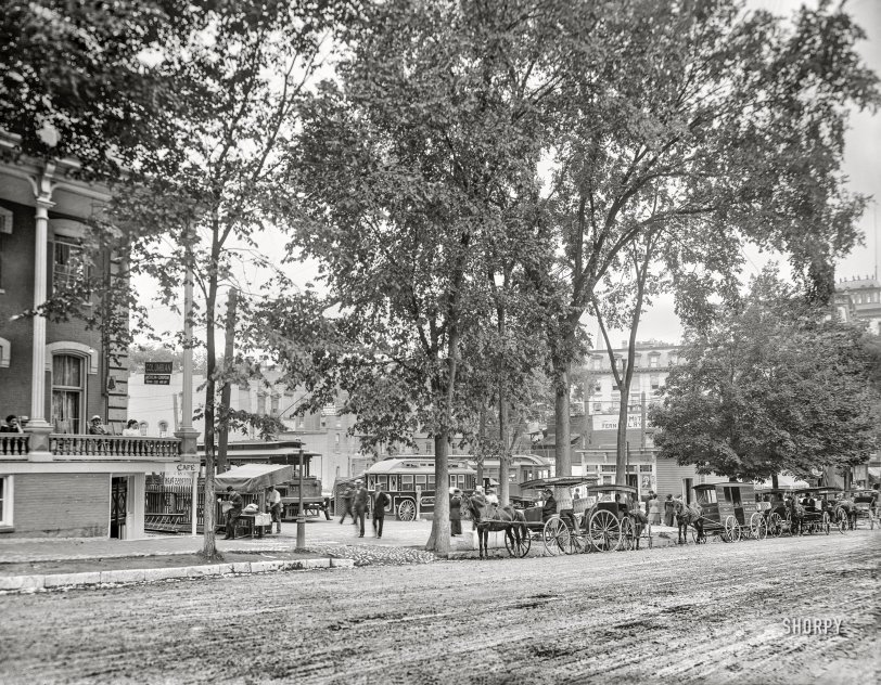 Saratoga Trolley: 1909 Saratoga Springs, New York, circa 1909. "The trolley station." Red-Hots only 5 cents! 8x10 inch dry plate glass negative, Detroit Publishing Company. View full size.