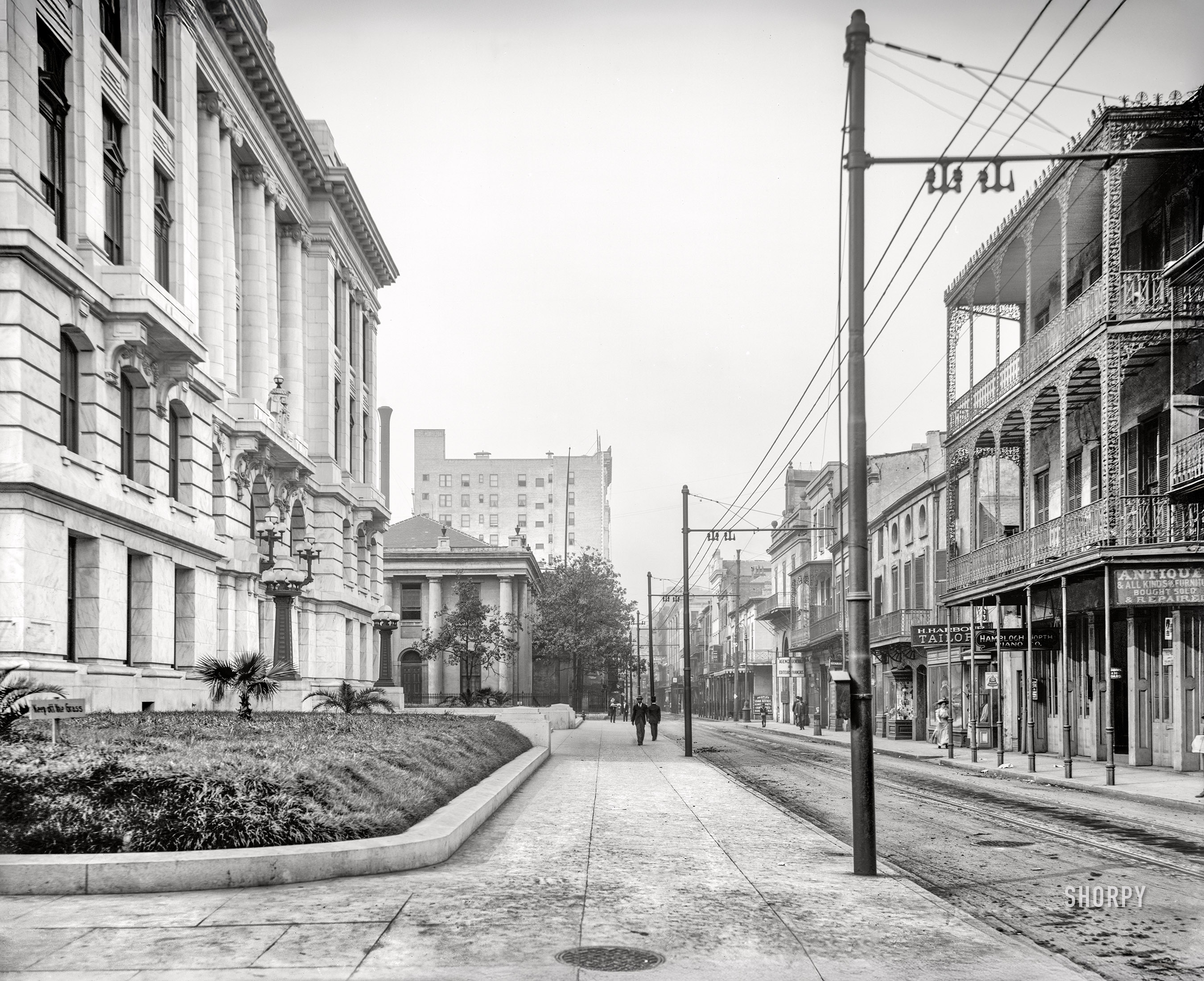 New Orleans circa 1910. "Royal Street from the courthouse." Pedestrians will kindly resist any urges to leap into the shrubbery. 8x10 glass negative, Detroit Publishing Co.