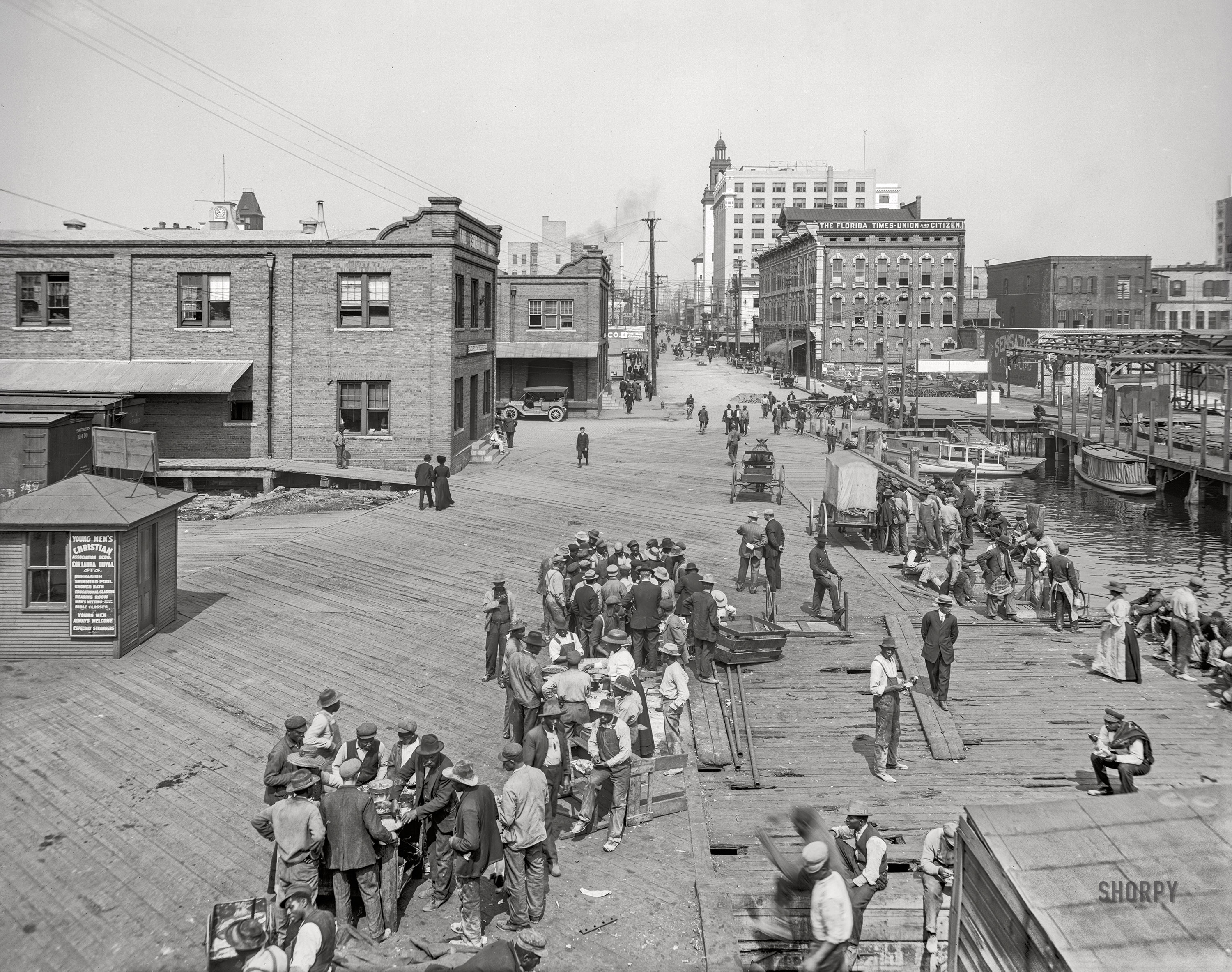 The St. Johns River circa 1910. "Lunch hour on the levee -- Jacksonville, Florida." 8x10 inch dry plate glass negative, Detroit Publishing Company.