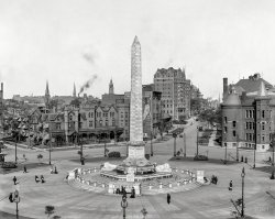 Buffalo, New York, circa 1911. "William McKinley monument, Niagara Square." 8x10 inch dry plate glass negative, Detroit Publishing Company. View full size.
A forefinger of stone, dreamed by a sculptor, points to the sky.
It says: This way! this way!

Four lions snore in stone at the corner of the shaft.
They too are the dream of a sculptor.
They too say: This way! this way!

— Carl Sandburg, Slants at Buffalo
