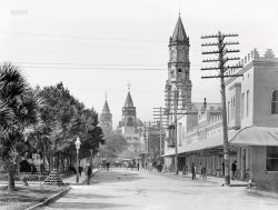 St. Augustine, Florida, 1906. "Cathedral Place at Charlotte Street, Plaza de la Constitución." The Cathedral Basilica of St. Augustine at right, with the Ponce de Leon Hotel at the end of the street. 5x7 inch glass negative, Detroit Publishing Company. View full size.