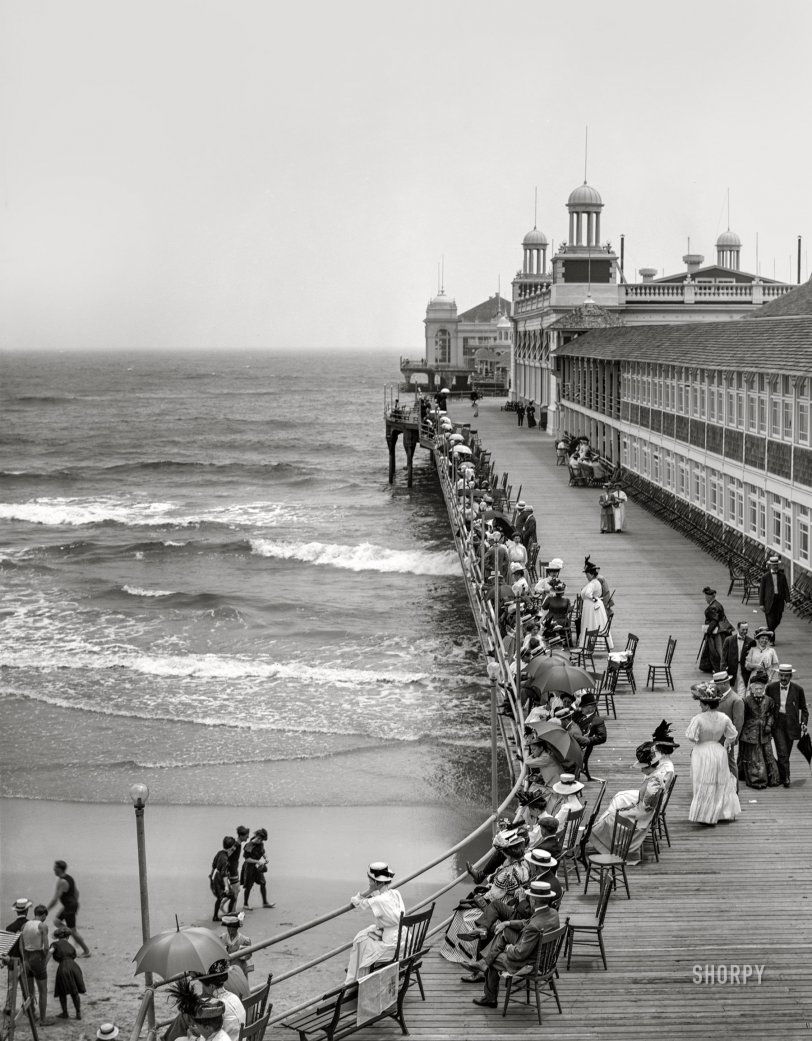 Watching and Wading: 1910 The Steel Pier circa 1910. "Watching the bathers -- Atlantic City, New Jersey." 8x10 inch dry plate glass negative, Detroit Publishing Company. View full size.