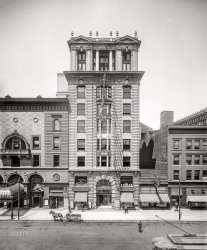 "Elks Temple, Monroe Avenue, Detroit." Next door to the Temple Theatre, where a poster advertises performances the week of May 1, 1910, of "School Boys and Girls," starring the English boy soprano Albert Hole. 8x10 glass negative, Detroit Publishing Co. View full size.