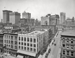 Detroit circa 1918. "Sky scrapers from interurban station, Jefferson Avenue at Bates Street." A view last glimpsed here. 8x10 inch glass negative, Detroit Publishing Company. View full size.