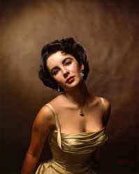 &nbsp; &nbsp; &nbsp; &nbsp; "In my studio Elizabeth was quiet and shy. She struck me as an average teenager, except that she was incredibly beautiful." -- Philippe Halsman

"In a décolleté silk evening dress Elizabeth Taylor sits for photographer Philippe Halsman. The former child star will be 17 next week." (Life magazine, February 21, 1949; photo taken in New York, October 1948.) Library of Congress Prints & Photographs Division. View full size.