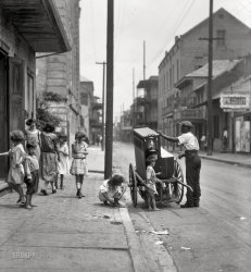 "Organ grinder, New Orleans, 1924." Nitrate negative by Arnold Genthe. View full size.

