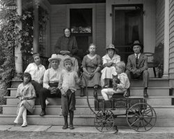 From ca. 1915 we bring you the John Doe family and their cat. 5x7 glass negative from that dusty box in Grandma's attic to an estate sale to you. View full size.