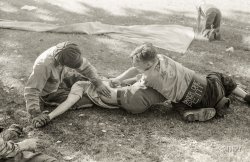 July 1941. "Roughhousing at Fourth of July picnic, Vale, Oregon." Mess with the boys of the Baker Motorcycle Club at your peril. 35mm acetate negative by Russell Lee. View full size.