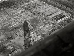 &nbsp; &nbsp; &nbsp; &nbsp; "With confidence in our armed forces, with the unbounding determination of our people, we will gain the inevitable triumph. So help us God."
-- Franklin D. Roosevelt, Dec. 8, 1941
March 1942. Washington, D.C. "Construction of temporary war emergency buildings on the Mall, near 16th and 17th Streets N.W., seen from the top of the Washington Monument." Acetate negative by John Ferrell for the Office of War Information. View full size.