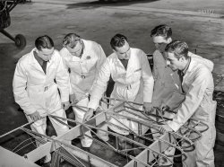 January 1942. "Fort Worth, Texas. Meacham Field. Civilian pilot training. Students learning about wing construction." Acetate negative by Arthur Rothstein. View full size.