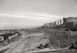 January 1942. "Memphis, Tennessee. Mississippi River levee." Medium format negative by Arthur Rothstein, Farm Security Administration. View full size.