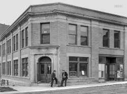 June 1939. "Morris State Bank, founded by Charles Morris (at right) during the boom days. Closed at present. Pony, Montana." Photo by Arthur Rothstein for the FSA. View full size.