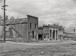 June 1939. "Abandoned stores in ghost mining town. Pony, Montana." Medium format acetate negative by Arthur Rothstein for the Farm Security Administration. View full size.