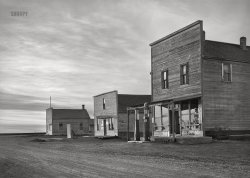 November 1939. "Agate, Sioux County, Nebraska." Back at the Grocry store. Medium format acetate negative by Arthur Rothstein for the Farm Security Administration. View full size.