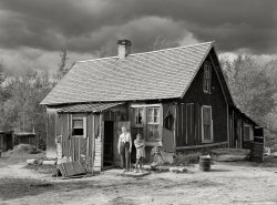 September 1937. "Cabin of Steve Flanders, cut-over farmer near Northome, Koochiching County, Minnesota." Medium format negative by Russell Lee for the Farm Security Administration. View full size.