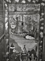 September 1938. "Decorations in back room of bar. ('The things that take you to HELL.') Raceland, Louisiana." Photo by Russell Lee for the Farm Security Administration. View full size.