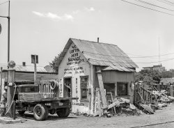 July 1939. "Automobile salvage business in Muskogee, Oklahoma." Medium format acetate negative by Russell Lee for the Farm Security Administration. View full size.
