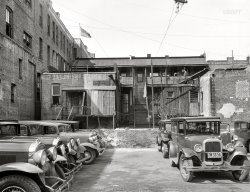 February 1936. "Mexican quarter of Los Angeles, California. Houses condemned to make space for the new Union Station. Average rental eight dollars. Some houses have plumbing." 4x5 nitrate negative by Dorothea Lange for the Resettlement Administration. View full size.