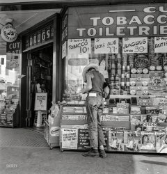August 1939. "Medford, Oregon. Half-grown farm boy on main drugstore corner in town." Not quite Lana Turner at Schwab's, even if the photographer is Dorothea Lange. Hey kid, your 15 minutes starts right ... now. View full size.