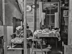December 1940. "Bath, Maine. War boom in a New England industrial town. Inside the home of Ralph Hart, a worker at the shipyards. The house is one of a small settlement of shacks springing up a few miles out of Bath." Acetate negative by Jack Delano. View full size.