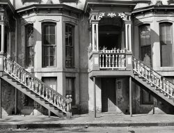April 1941. "Row of houses on East Charlton Street, Savannah, Georgia." Acetate negative by Jack Delano for the Farm Security Administration. View full size.