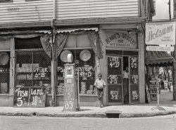 June 1939. "Negro grocery store. Sylvania Savannah, Georgia." Medium format acetate negative by Marion Post Wolcott for the Farm Security Administration. View full size.