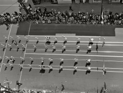 May 1940. "Cotton carnival. Memphis, Tennessee." Medium format acetate negative by Marion Post Wolcott for the Farm Security Administration. View full size.