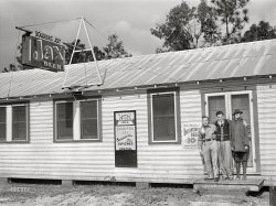 December 1940. Starke, Florida. "Soldiers Joy Cafe, newly constructed for construction workers near Camp Blanding." Acetate negative by Marion Post Wolcott. View full size.