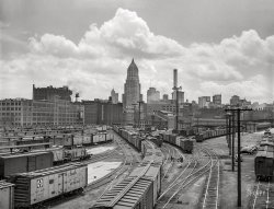 June 1941. Pittsburgh, Pennsylvania. "Carloads of fruits and vegetables at city terminal." Medium format negative by John Vachon for the Farm Security Administration. View full size.