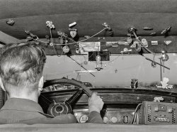 November 1941. "Trinkets in migrant agricultural worker's automobile. Wilder, Idaho." Medium format acetate negative by Russell Lee for the Farm Security Administration. View full size.