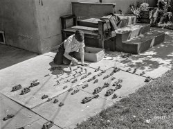 May 1942. "Turlock, California. Son of family in the upper middle income group. War games are popular with the boys." Photo by Russell Lee, Office of War Information. View full size.
