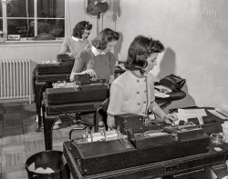 December 1941. "Washington apartment house turned into office space for the Foreign Function Bureau." Acetate negative by John Collier, Office of War Information. View full size.